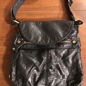 Purse— black leather-like.